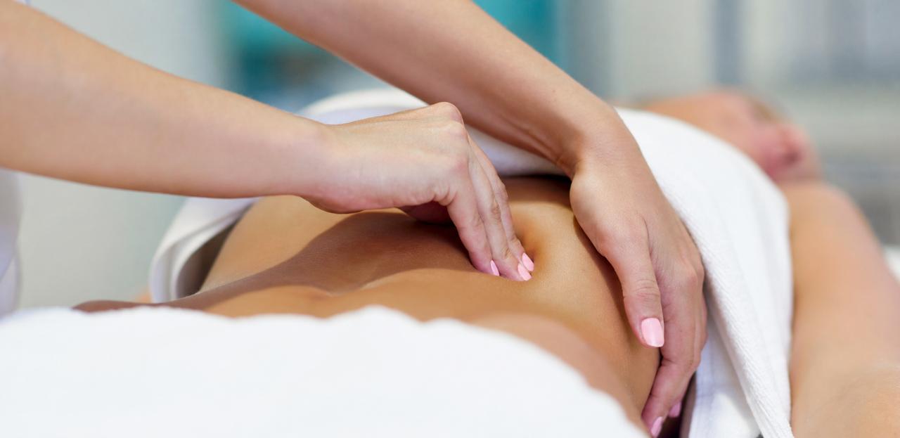Gentle hands-on visceral osteopathy treatment for adult abdominal and side-body mobility support