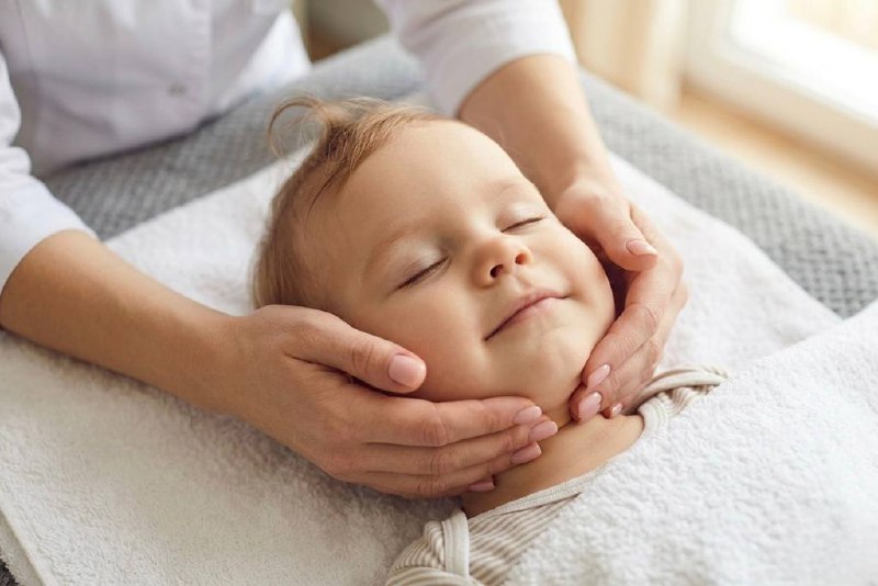 Gentle cranial osteopathic treatment for a toddler